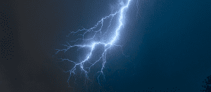 Blogs 14 Lightning in the night sky and mountains with trees